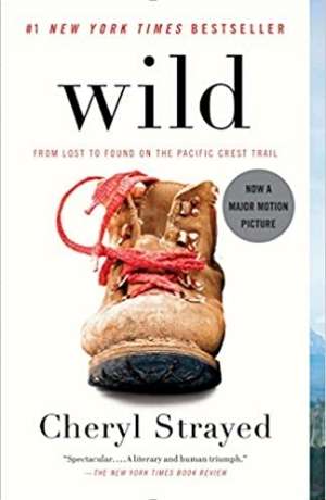 Book cover of Wild : from lost to found on the Pacific Crest Trail By Strayed, Cheryl. The cover is white with a well worn tan boot that would go above the ankle. The shoelace is red and untied.