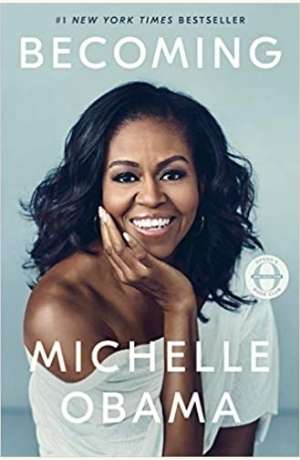 Book cover of Becoming by Michelle Obama. There is a photograph of her bust on a pastel background. She is smiling.